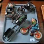 Tray with a soldered metal model car, a model Triang bike ridden by a boy scout (damaged), a model