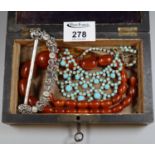 A string of large 1930's beads, turquoise glass necklace and a large buckle. (B.P. 21% + VAT)