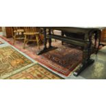 Large Middle Eastern red ground carpet overall foliate decorated around central medallion with