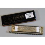Two vintage harmonicas, one Hohner, the other marked 'Black Prince'. (2) (B.P. 21% + VAT)