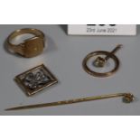 Yellow metal signet ring, diamond set pin, 9ct gold diamond set clover leaf and a part pendant (