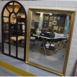 Large modern gilt framed bevel plate mirror, together with a modern oak finish arch top mirror. (