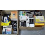 Two boxes of photographic equipment to include: two boxed Miranda lenses in good condition, a
