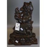 Cast iron moulded doorstop in the form of Punch and Judy. (B.P. 21% + VAT)