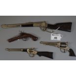 Four miniature cap guns, one marked 'Redondo'. (4) (B.P. 21% + VAT)