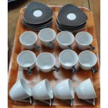 Twelve small Thun Studio Czechoslovakian coffee cups and saucers in brown and white with silver