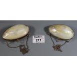 Two similar mother of pearl and white metal purses in the form of shells with chains. (B.P. 21% +