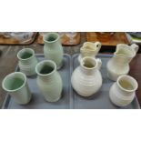 Two trays of Bourne Denby Derby pottery, one tray of green vases and one of cream coloured jugs