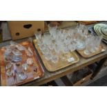 Three trays of various glassware to include: moulded glass shoe ornaments, various animal ornaments;