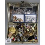 Jewellery casket comprising assorted items to include; dice, costume jewellery, cuff links, thimbles