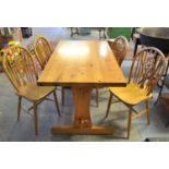 Modern pine refectory type table, together with a set of four beech wheel, hoop and spindle back