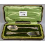 Cased christening set comprising; fork and spoon with chased decoration, 2.2 troy ozs approx, in