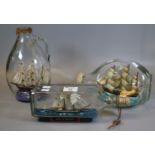 Three glass ships in bottles to include; Prince de Neufchatel U.S.S Constitution etc. (3) (B.P.