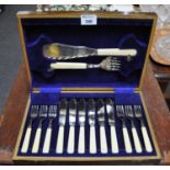 A velvet lined box of fish cutlery, two fish servers and a set of six fish knives and forks with