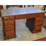 Edwardian mahogany knee hole desk having leather inset top with a bank of three drawers to each