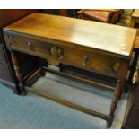 Early 20th century oak two-drawer side table on baluster turned legs. (B.P. 21% + VAT)
