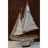 Wooden and painted study of a pond yacht with sails. (B.P. 21% + VAT)