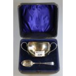 Silver two handled sucrier and spoon, Birmingham hallmarks. 4.6 trot oz (B.P. 21% + VAT)