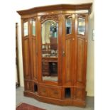 Edwardian walnut and mahogany break front mirrored wardrobe with dental cornice and fitted