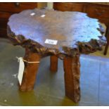 Rustic burr walnut three legged stool. (B.P. 21% + VAT)