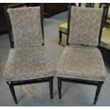 Pair of Edwardian ebonised side chairs, probably with later upholstery. (2) (B.P. 21% + VAT)