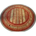 Modern Kashkuli Gabbeh collection red ground carpet of circular form. (B.P. 21% + VAT)
