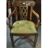 Unusual curve and lattice back brass inlaid open armchair with scroll arms on button back seat and