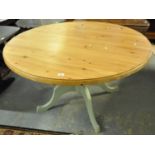 Modern pine centre or dining table on painted quatreform base. (B.P. 21% + VAT)