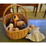 Wicker basket containing assorted dolls and doll parts, heads, limbs etc. (B.P. 21% + VAT)