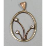 Yellow metal and diamond pendant. Tests as 14ct gold. Approx weight 4.8 grams. (B.P. 21% + VAT)