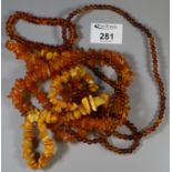 An amber necklace. Approximate weight 48.8 grams. A copal amber beads and bracelet and a string of