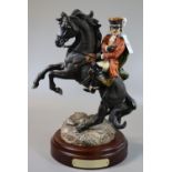 A Royal Doulton china limited edition figure of Dick Turpin on rearing black horse, modelled by G.