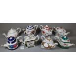 A set of eight porcelain art miniature floral teapots. (B.P. 21% + VAT)