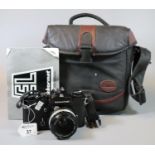 Nikkormat EL 35mm SLR camera with Nikon 50mm lens, in soft textile case with original instruction