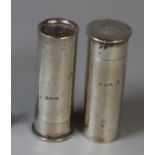 A pair of novelty silver peppertrees in the form of shotgun shells. (2) (B.P. 21% + VAT)