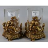 Pair of glass cylindrical candle holders with gilded composition mounts, overall decorated with