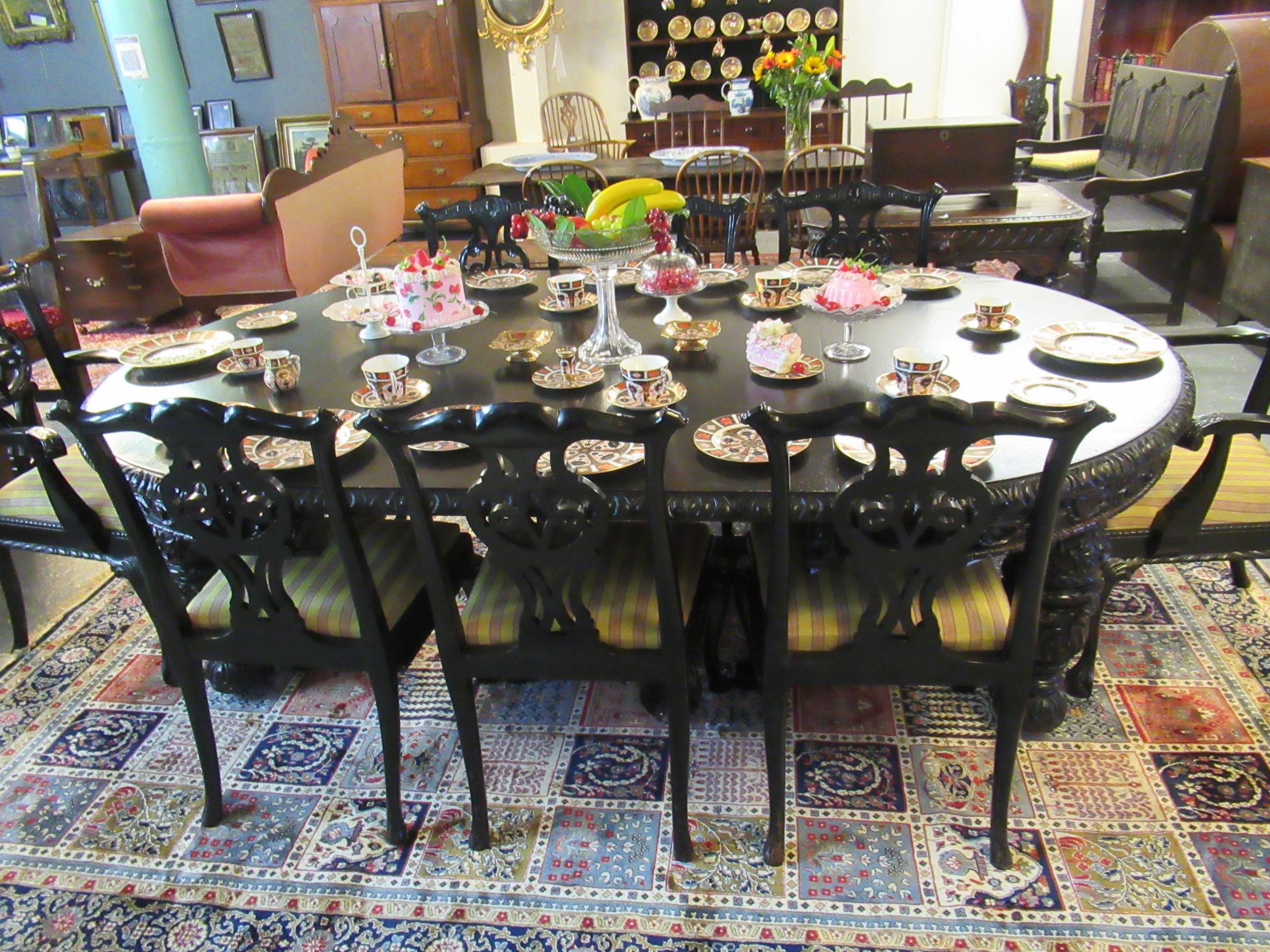 Late Victorian stained oak extending dining table with three additional leaves and winder. The - Image 4 of 11