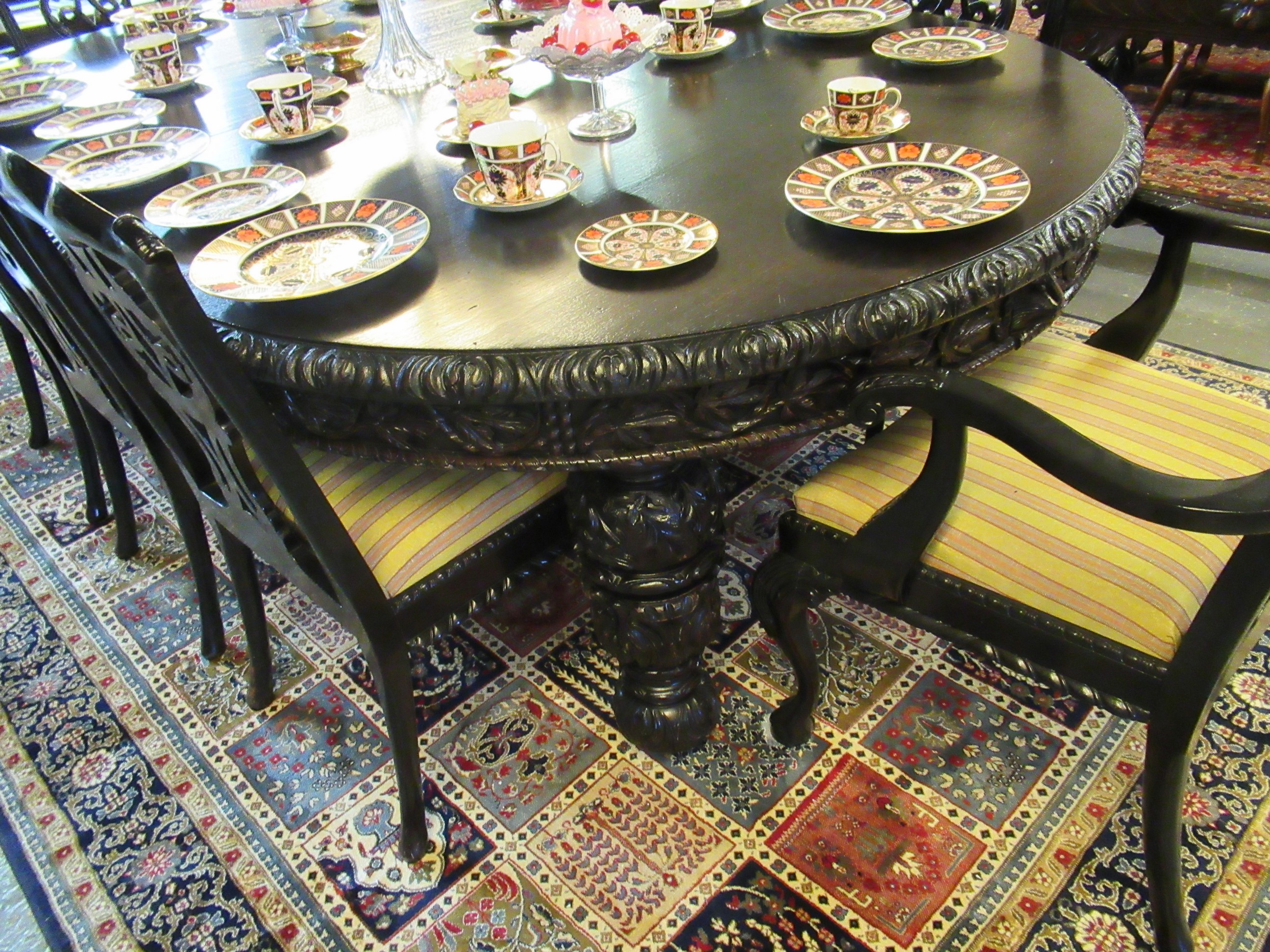Late Victorian stained oak extending dining table with three additional leaves and winder. The - Image 5 of 11