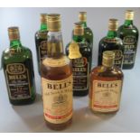 Five bottles of Bell's DeLuxe 12 years old blended Scotch whisky, 70% proof, 26 2/3 fl ozs, in