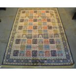 Blue and cream ground full pile Kashmir carpet central area with square panels of flowers and