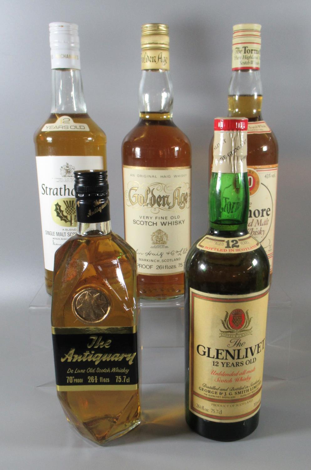 Collection of vintage whiskies to include; Golden Age Deluxe very fine old Scotch whisky John Haig &