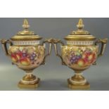 A pair of 1970's Royal Worcester pot pourri vases and covers, hand painted with plums, grapes,