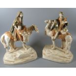 Two similar early 20th Century Bohemian porcelain spill holder figures, one an Arab on a camel,