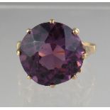 9ct gold amethyst ring. The oval amethyst approx 14mm. Ring size P. Approx weight 6.4 grams. (B.P.