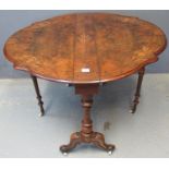 Victorian burr walnut inlaid Sutherland table on turned supports with scroll feet, cups and casters.