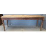 Late 19th Century pine farmhouse kitchen or serving table, the moulded top above turned baluster