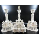Royal creamware 'Luminaries' garniture set to include; a table lamp and a pair of candlesticks