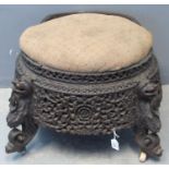 19th Century Indo-Burmese carved padouk wood stool of circular form with stuff over upholstered seat