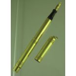 18ct gold telescopic fountain pen with 14ct gold nib stamped to loop. Approx weight 19.2 grams. (B.