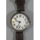 Interesting First World War period silver wristwatch with painted Arabic white enamel face on a